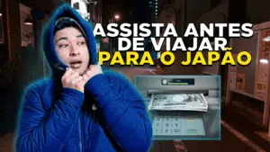 pessoa olhando onde está escrito assista antes de viajar para o Japão